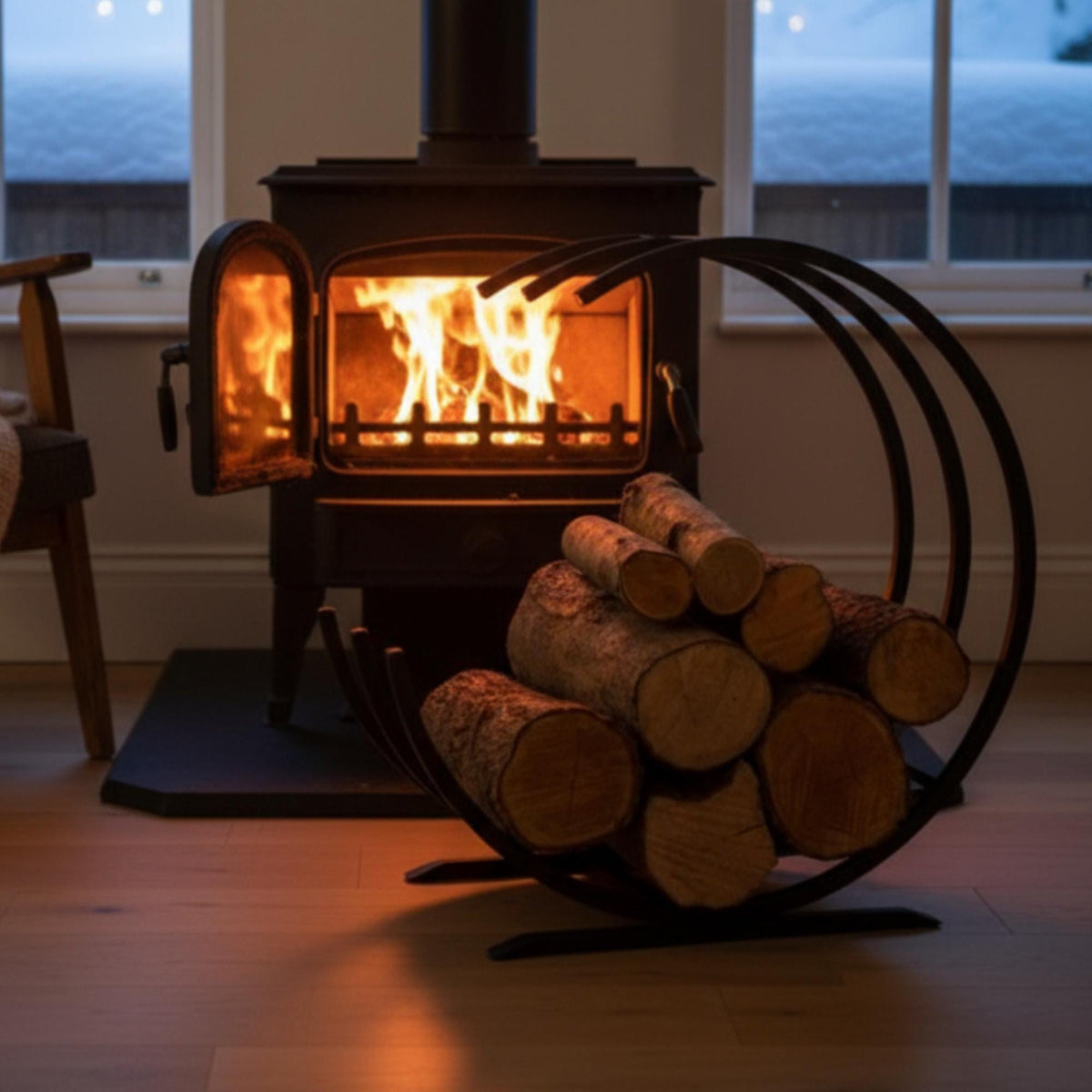 Modern curved firewood rack black metal indoor log holder, minimalist round firewood storage for fireplace, freestanding steel log rack for living room décor, durable powder coated firewood organizer for indoor wood storage