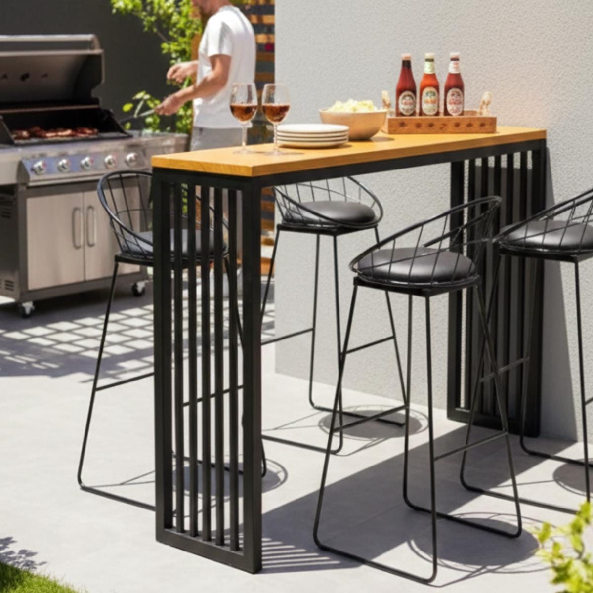 Contemporary bar table with metal frame and wood top in kitchen setting