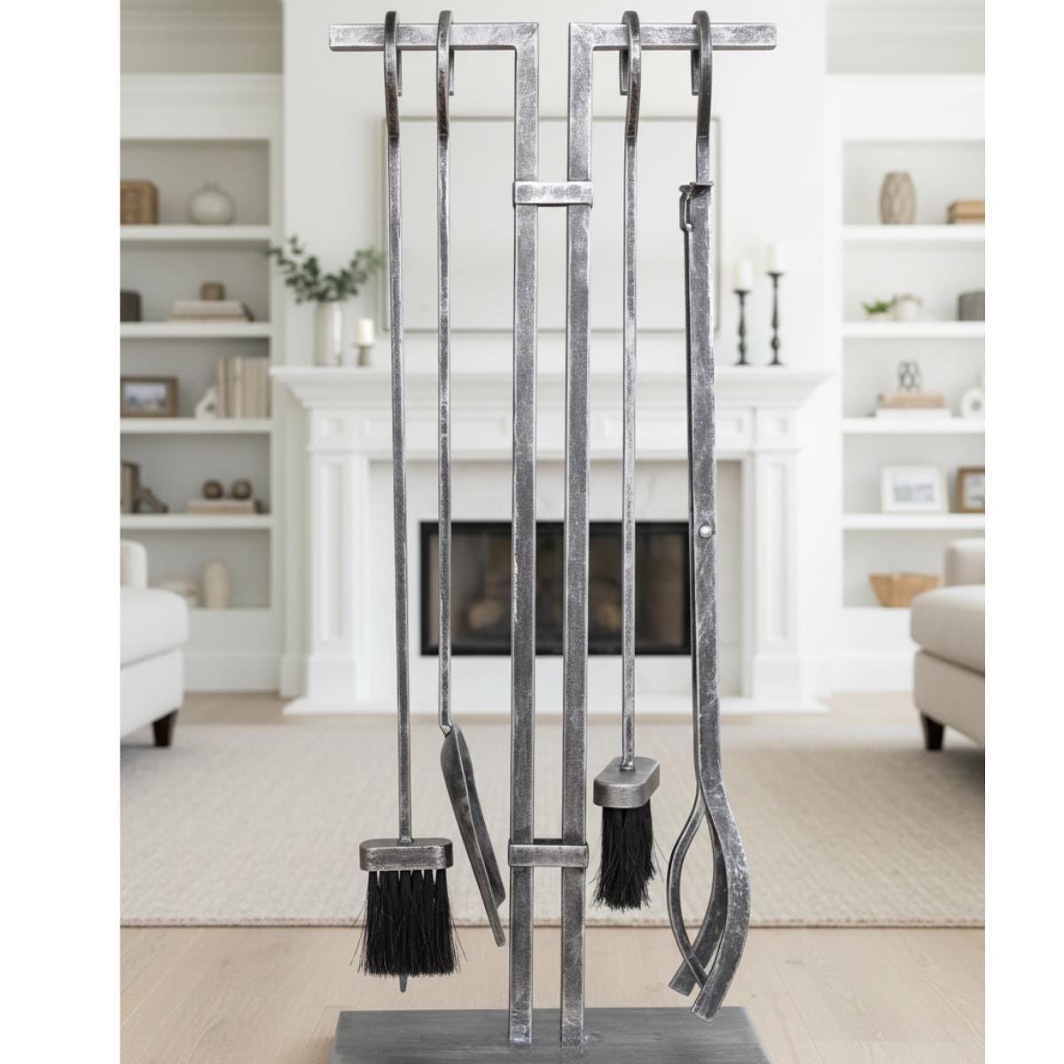 Indoor fireplace tools set brushed metal hearth tools in clean interior