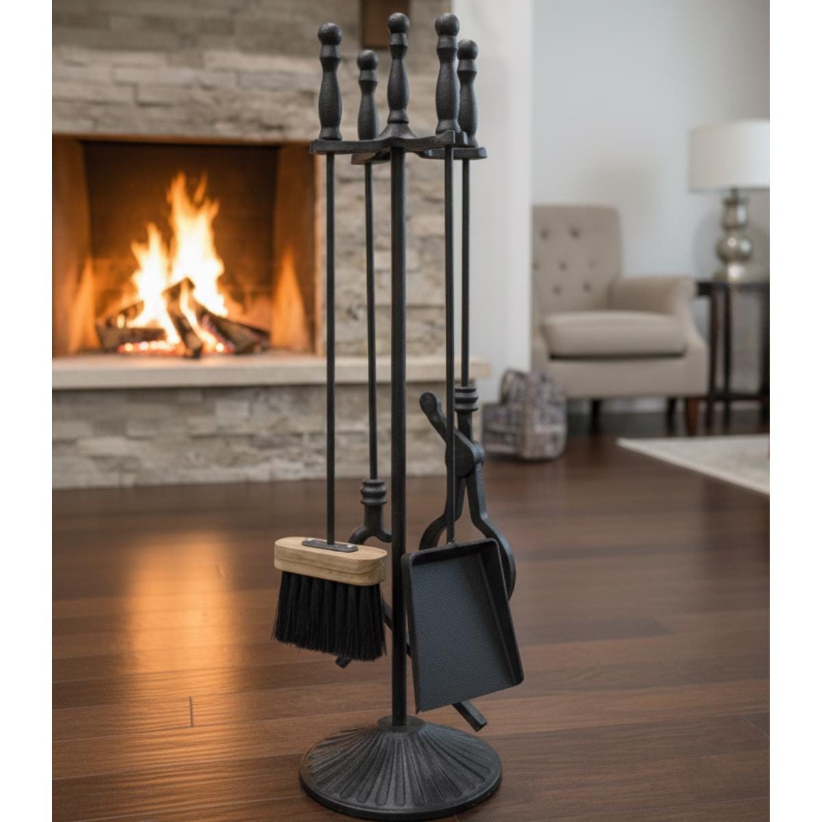 Indoor fireplace tools set with metal stand used as functional accessories