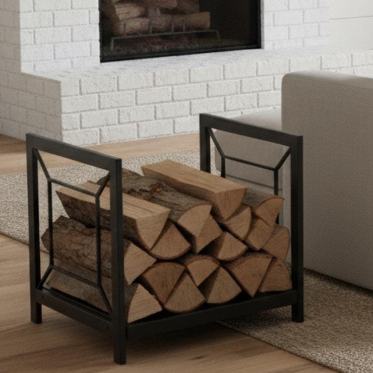 Living room with beige sofa, fireplace, and firewood basket.
