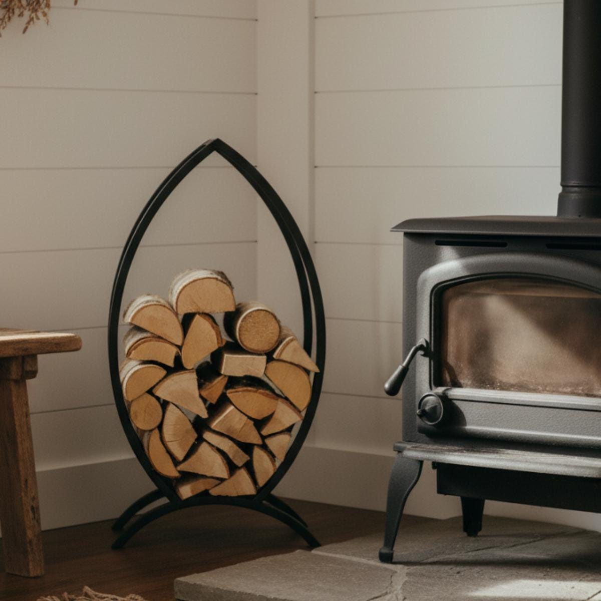 Outdoor log holder firewood rack with metal frame used on patio space