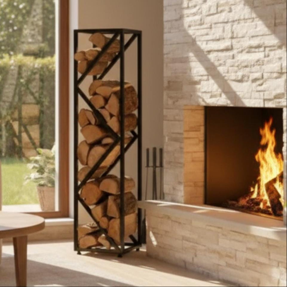 Living room with a fireplace, firewood rack, and view of greenery outside.