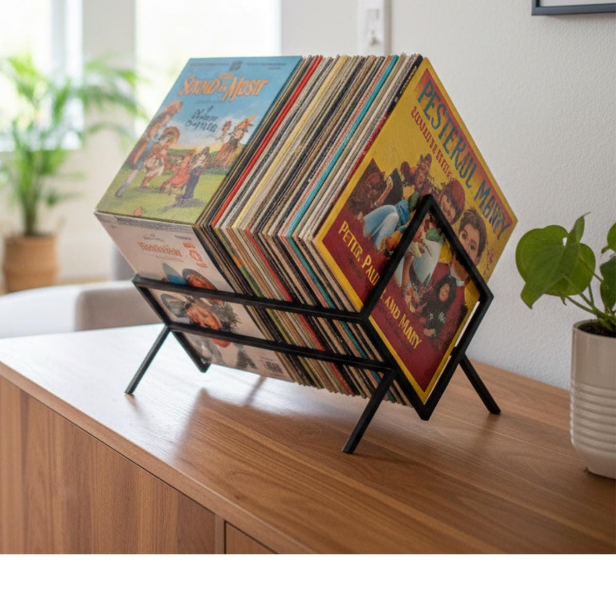 Vinyl record rack metal stand designed for album display and easy access