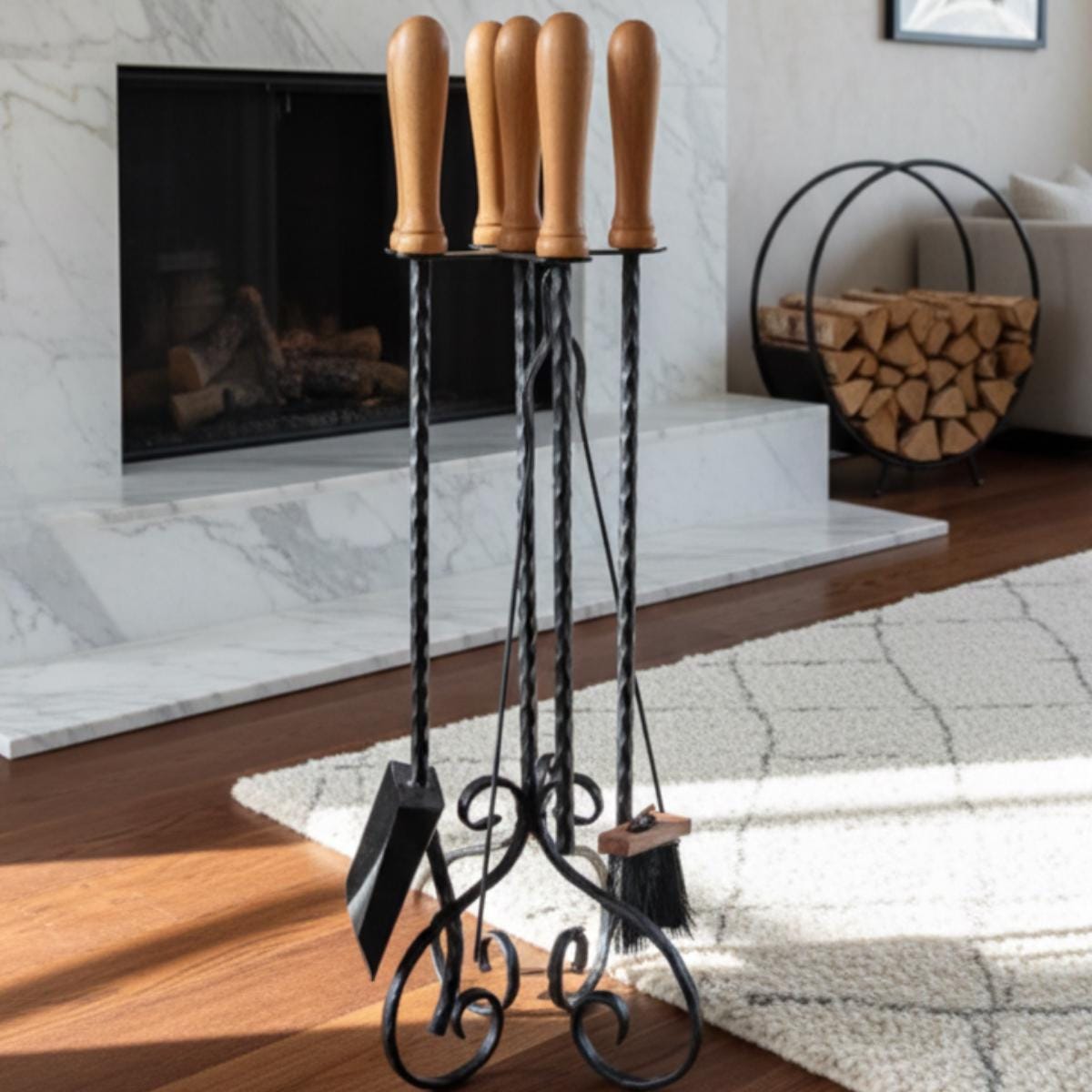 Wrought iron fireplace tool set with wood handles used as decorative accessories